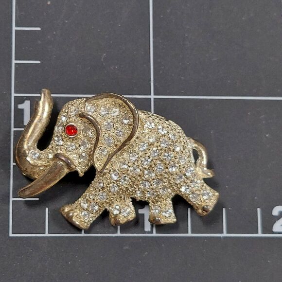 Vintage Rhinestone Elephant Brooch AD 2001 Red Eye Gold Tone Trunk Up Tusk Pin - Picture 11 of 11